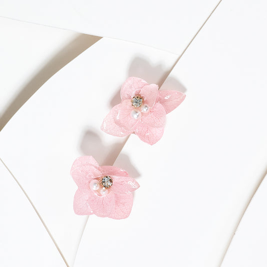 Aretes flor encapsulada en resina
