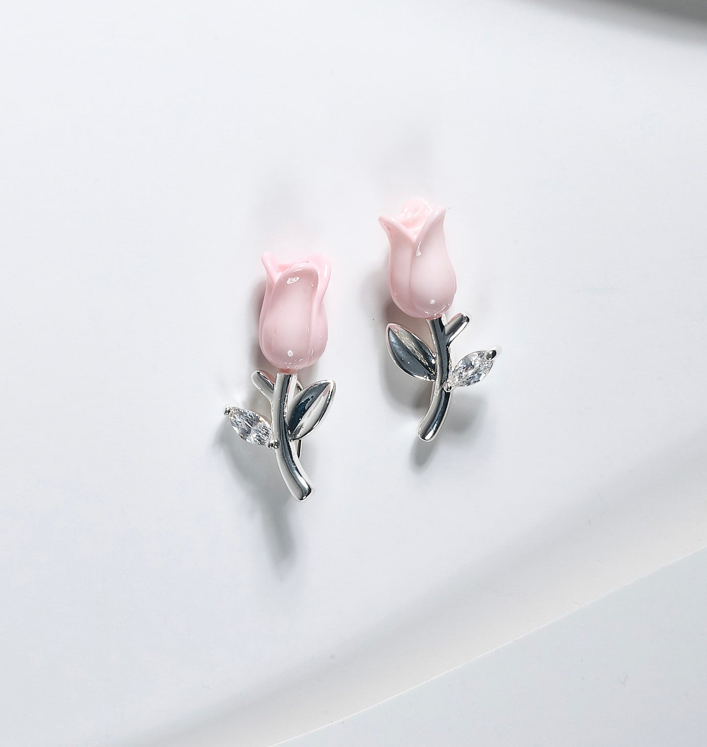 Aretes rosas
